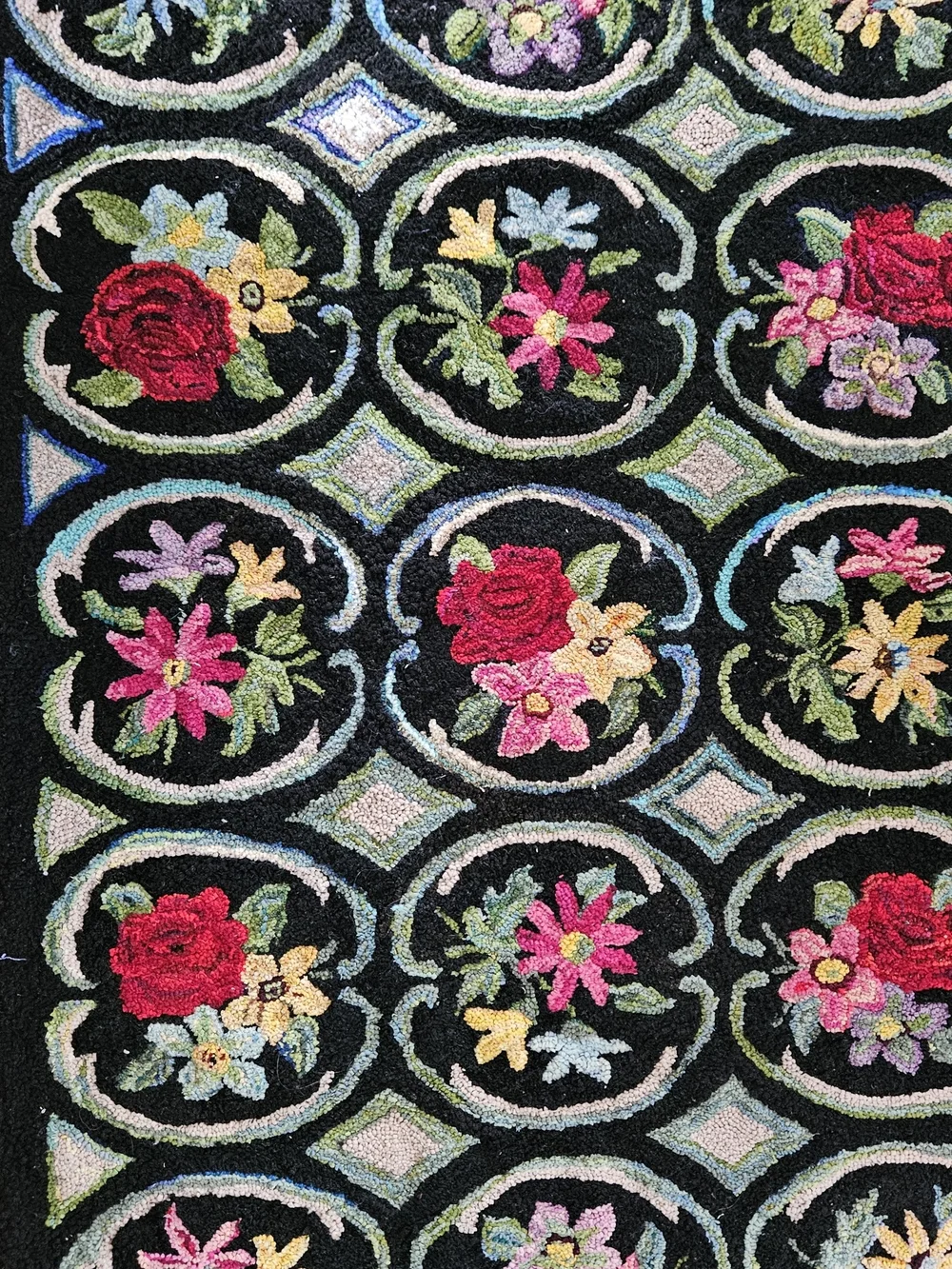 Hand-hooked Floral Rug in Black with Multicolor Flowers